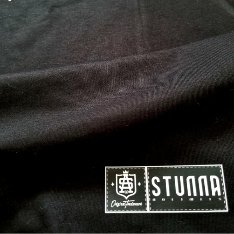 small SA trademarked logo, printed on the bottom left of tshirt